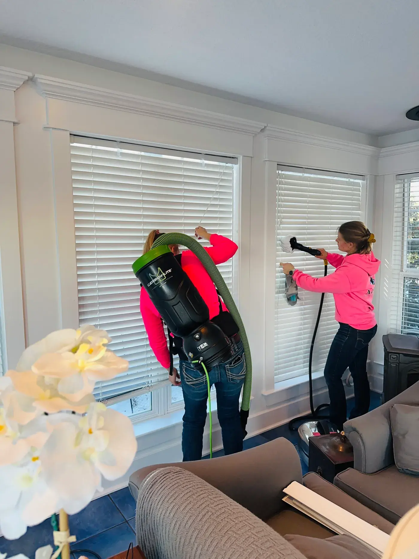 Peace Home Services team steam cleaning blinds