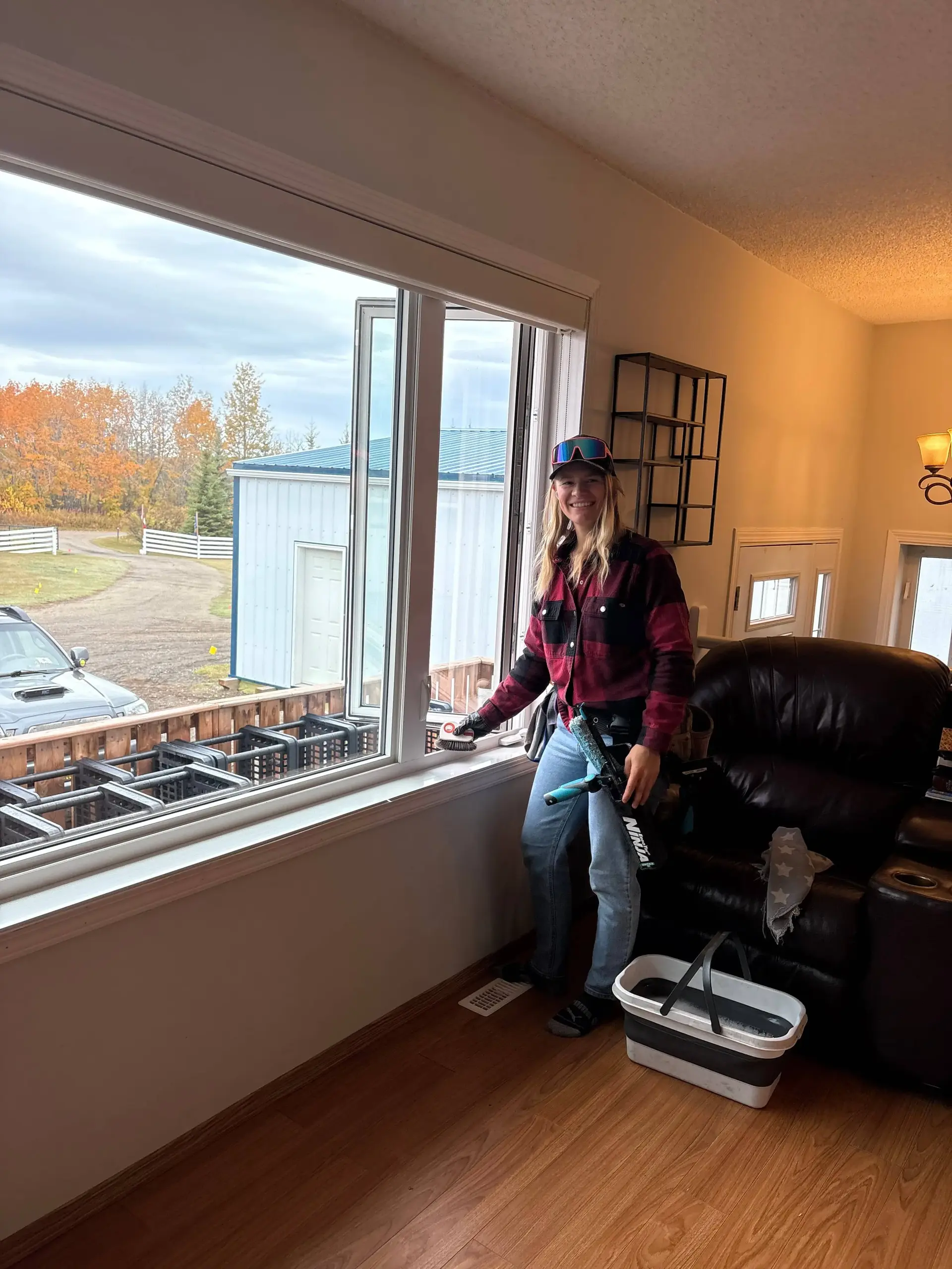 Linnae performing Light Fixture Cleaning